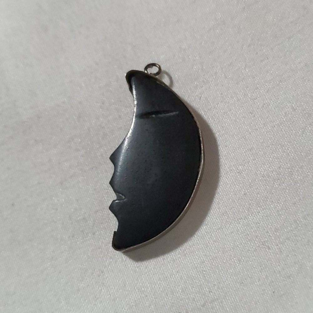 Carved onyx crescent moon pendant